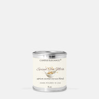 A small cylindrical metal candle tin with a cream label reading 'Candle Elegance Sage & Cypress' on a light gray background.