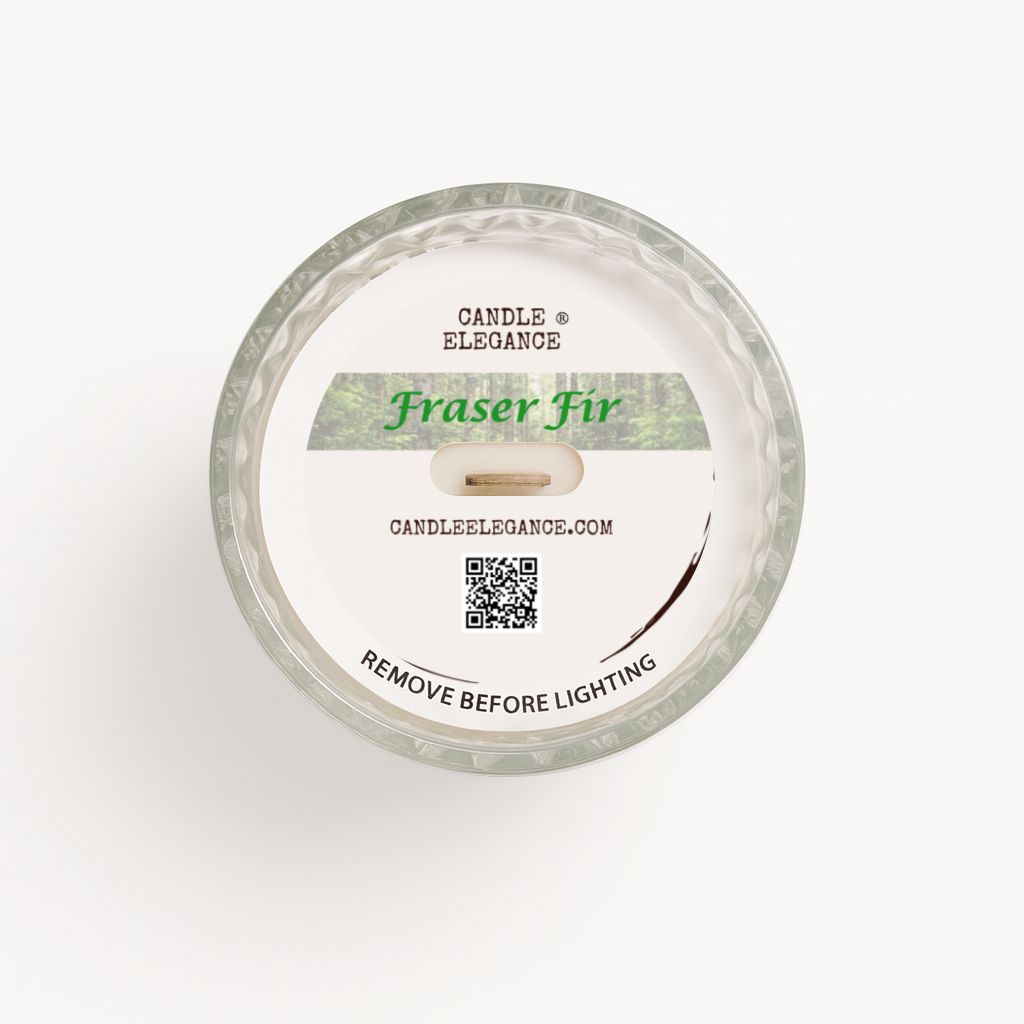 Top-down view of a round dust cover,  textured glass candle with a white wax surface and a printed label reading 'Candle Elegance' and 'Fraser Fir'.