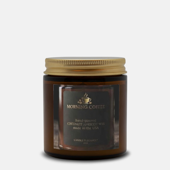 A 4 oz hand-poured soy wax candle by Candle Elegance in a dark amber glass jar with a gold metal lid and a black label reading 'MORNING COFFEE'.