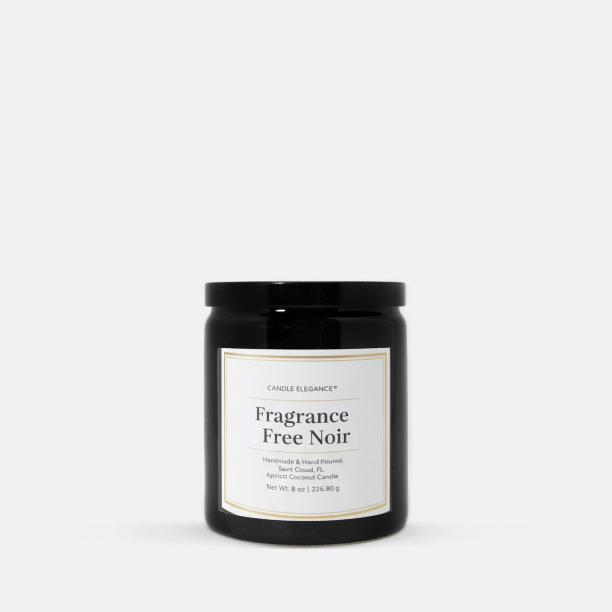 A black glass jar candle with a white label reading 'Fragrance Free Noir' by Candle Elegance, centered on a light gray background.