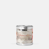 A silver metal tin candle with a clear label reading 'Candle Elegance Bohemian Rose' on a light gray background.