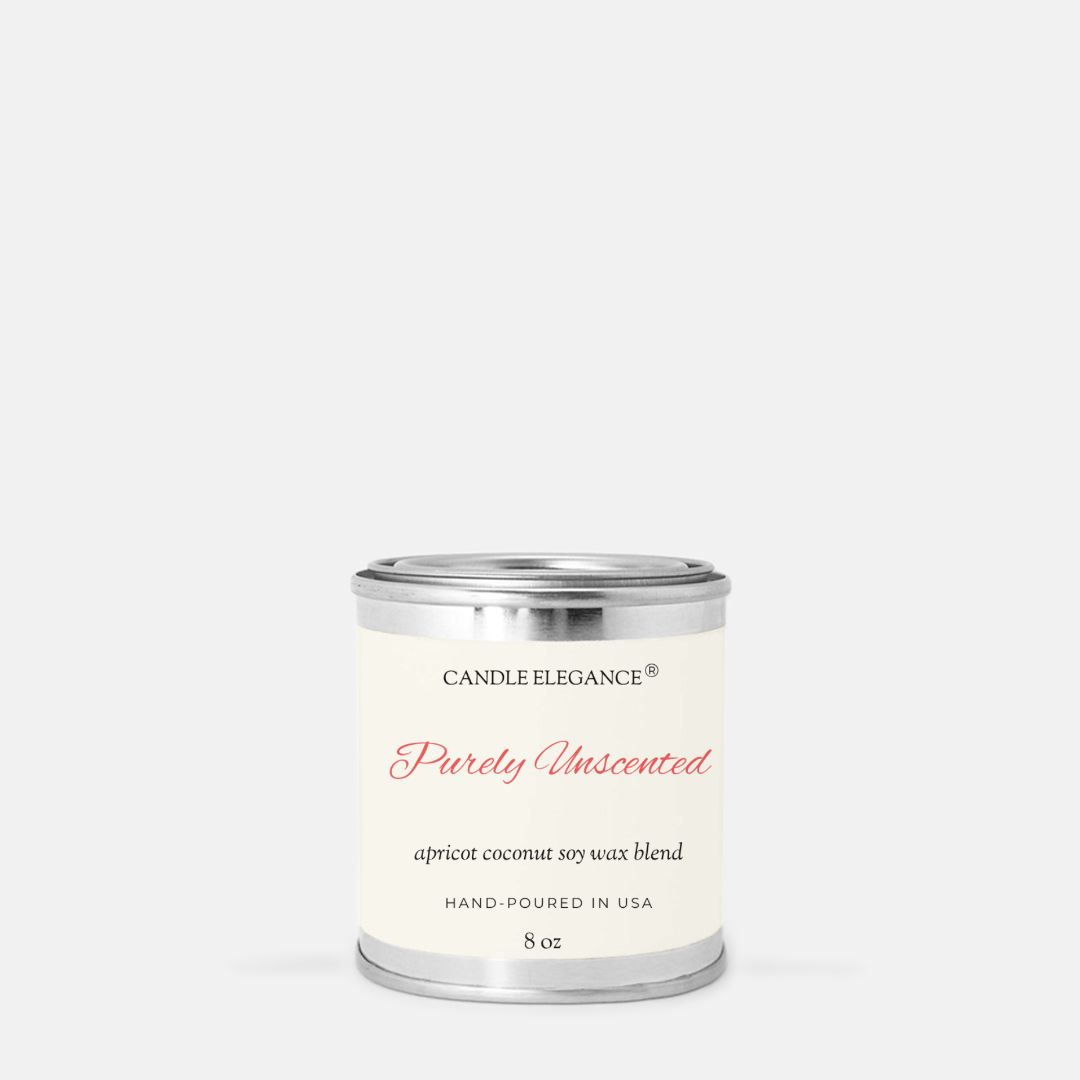 A small cylindrical metal candle tin with a cream label reading 'Candle Elegance Purely Unscented' on a light gray background.