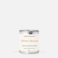 A small cylindrical metal candle tin with a cream label reading 'Candle Elegance Purely Unscented' on a light gray background.