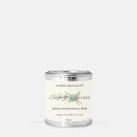 A small cylindrical metal candle tin with a cream label reading 'Candle Elegance Sage & Cypress' on a light gray background.