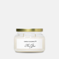 A jar candle with cream-colored wax, a white label reading 'CANDLE ELEGANCE Pure Glow', and a metallic gold lid, set against a plain light gray background.