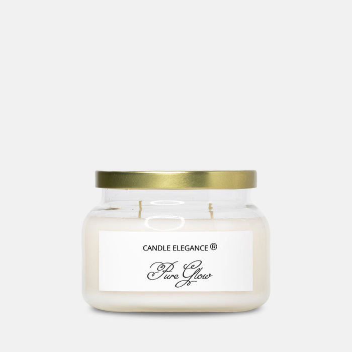 A jar candle with cream-colored wax, a white label reading 'CANDLE ELEGANCE Pure Glow', and a metallic gold lid, set against a plain light gray background.