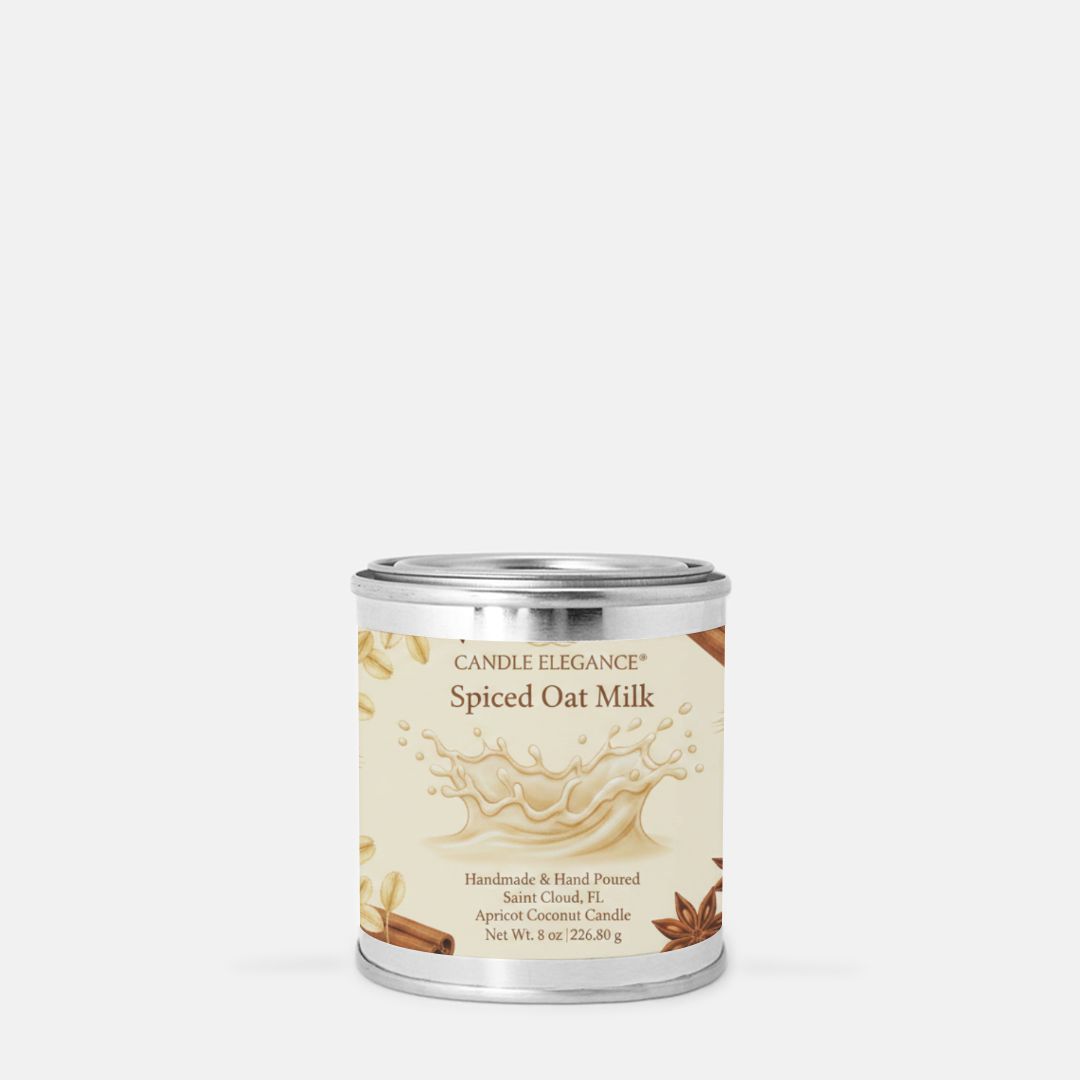 A single candle tin labeled CANDLE ELEGANCE Spiced Oat Milk, shown on a plain light gray background.