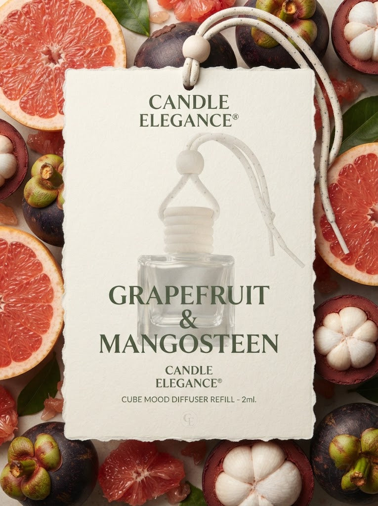 A vertical white product tag for Candle Elegance Grapefruit & Mangosteen cube mood diffuser refill, surrounded by sliced grapefruit, mangosteen fruits, and green leaves on a white background.