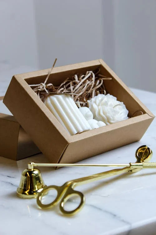 Effortlessly extinguish candles with the gold Candle Snuffer by Candle Elegance. This handy tool features a small cone at the end of a handle, making it easy to quickly and safely put out burning candles. Say goodbye to messy wax spills and potential fire hazards. Perfect for any candle lover.