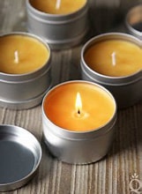 Organic Beeswax Candle in a tin with a wooden background