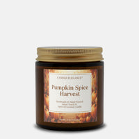 A 4 oz amber glass jar candle with a gold metal lid and a label reading 'Pumpkin Spice Harvest' by Candle Elegance, set against a plain light gray background.