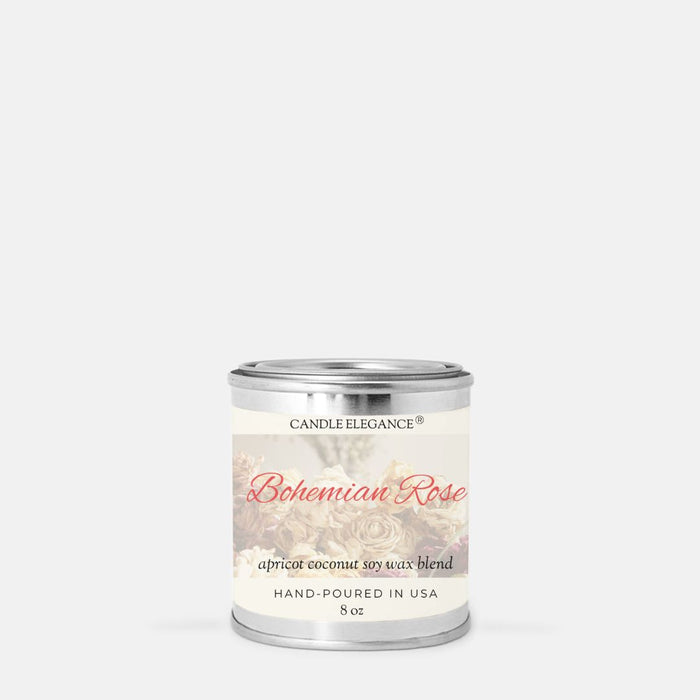 A 8 oz metal tin candle from Candle Elegance, named 'Bohemian Rose', featuring a cream label with rose illustrations and red script text, set against a plain light gray background.
