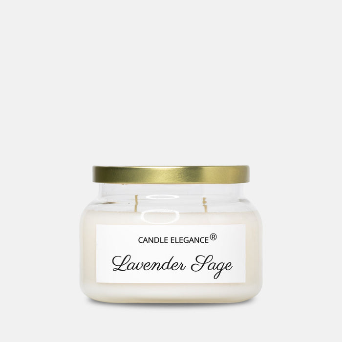 A Candle Elegance Lavender Sage scented candle in a clear glass jar with a gold metal lid and a white label, set against a light gray background.