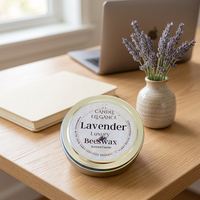 Lavender travel candle on an office desk