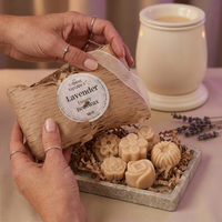 Lavender wax-melt package being opened as a gift