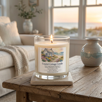 Lit Coastal Cottage Candle in a cozy cottage at sunset