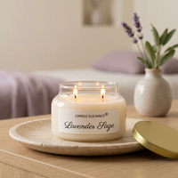 Lit Lavender Sage candle in a tranquil spa-inspired setting