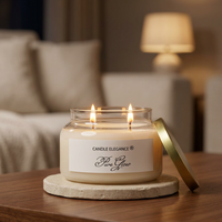 Lit Pure Glow candle in an elegant evening living room