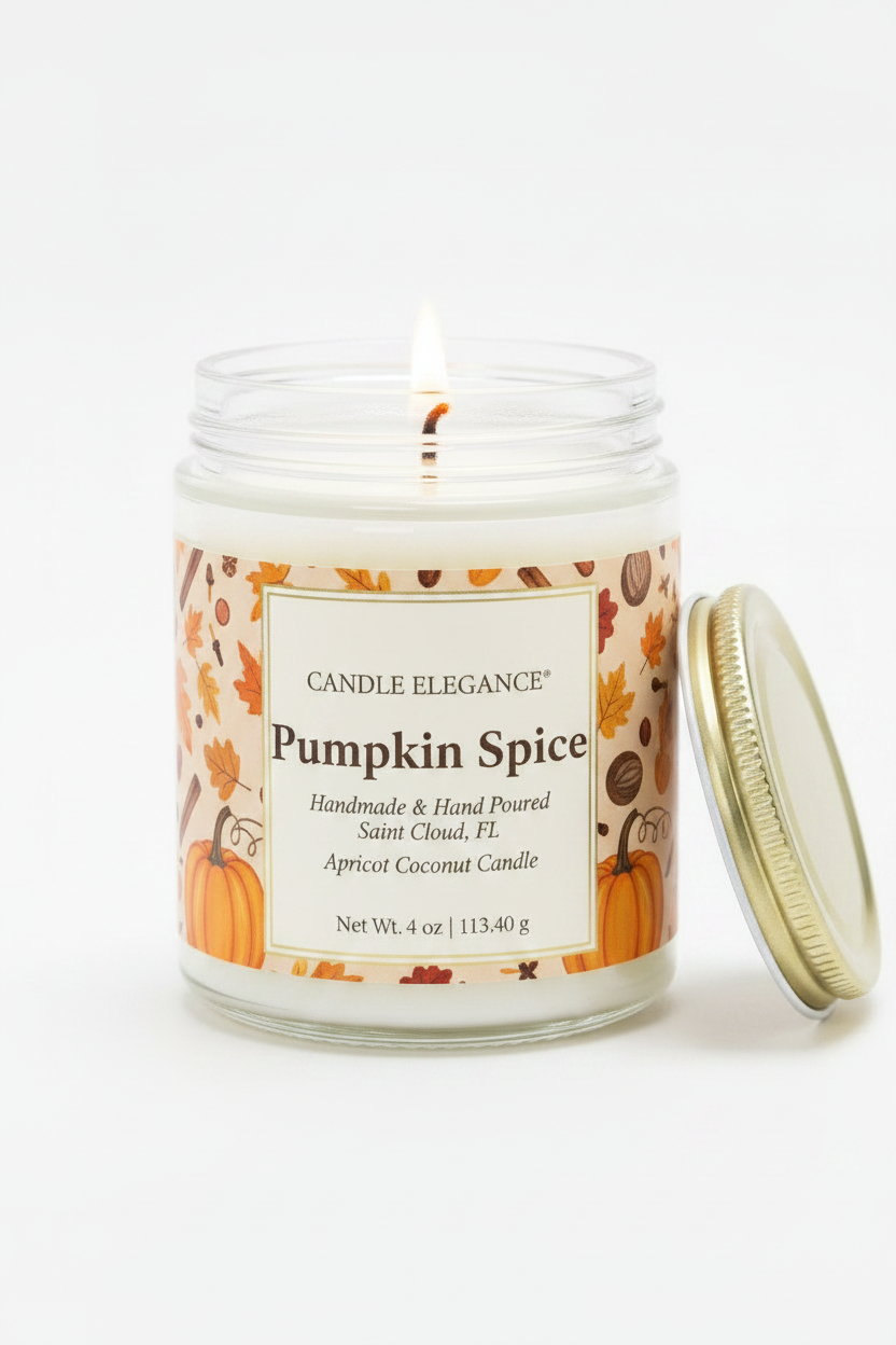 A lit Candle Elegance Pumpkin Spice jar candle with a white wax body, clear glass jar, and a gold metal lid resting beside it on a clean white background.