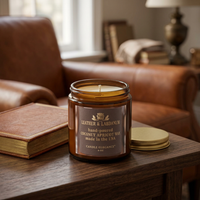 Unlit Leather & Labdanum candle in a warm leather-accented reading room