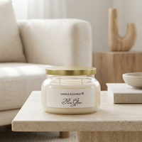 Unlit Pure Glow candle in a serene sunlit living room