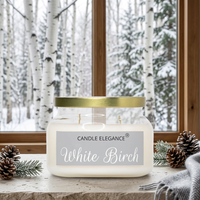 White Birch candle with snowy birch trees in the background